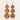 Colorful beaded earrings on a light background
